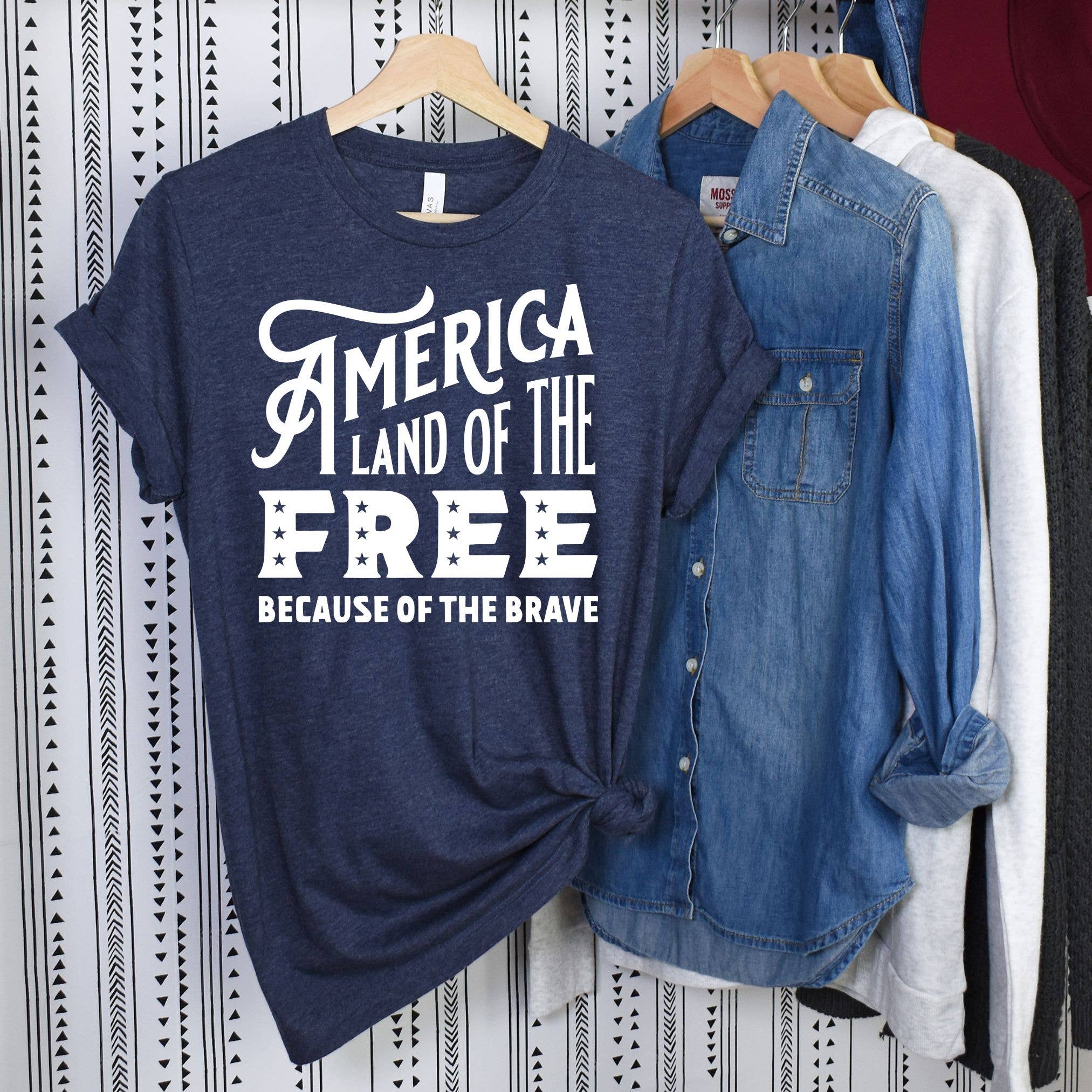 Land of the Free Because of the Brave Navy Tee