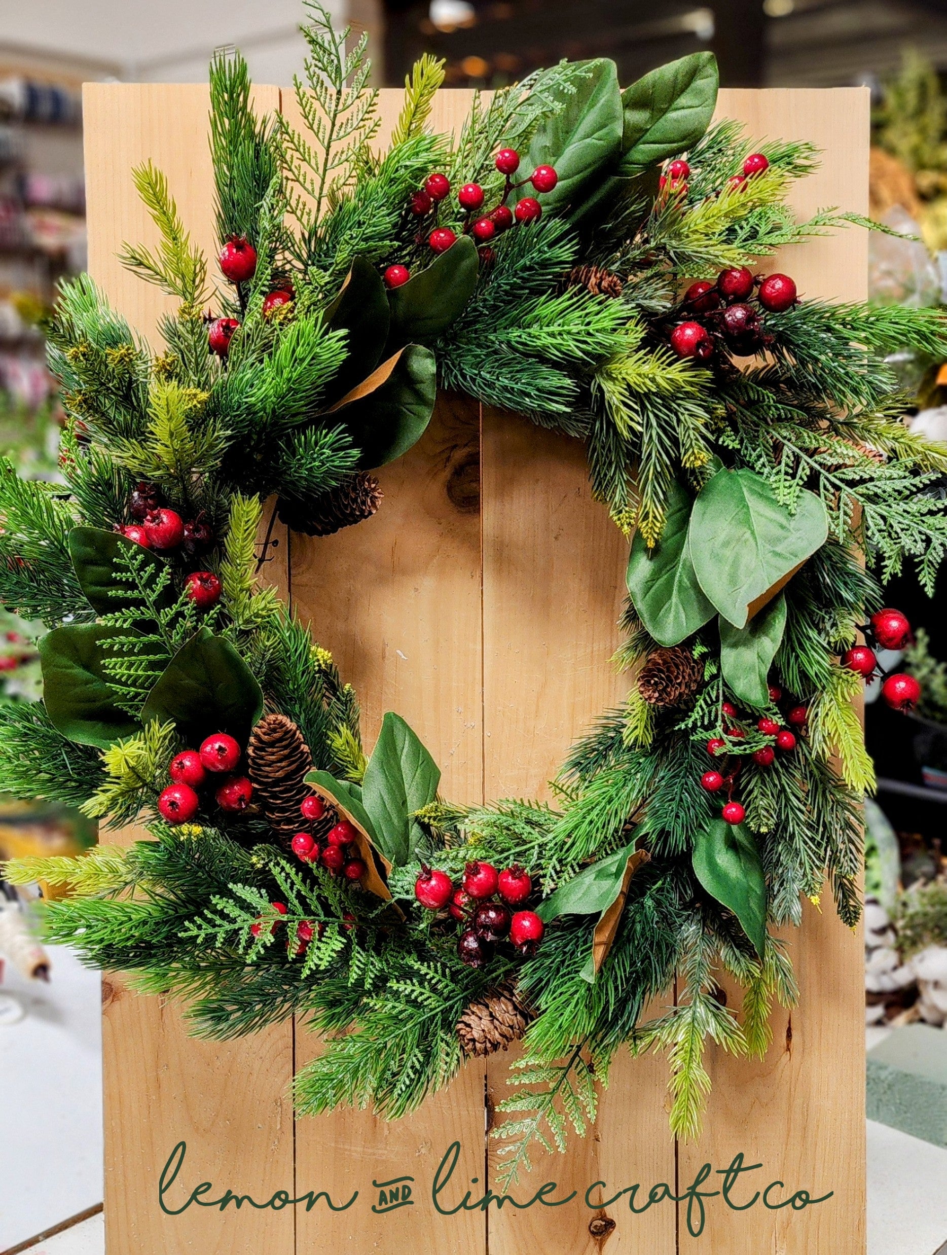 Winter Pine and Magnolia Leaf Grapevine Wreath